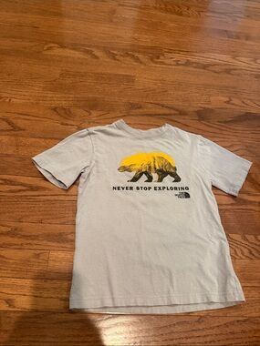 The North Face Light Gray Tee with Yellow Bear Graphic